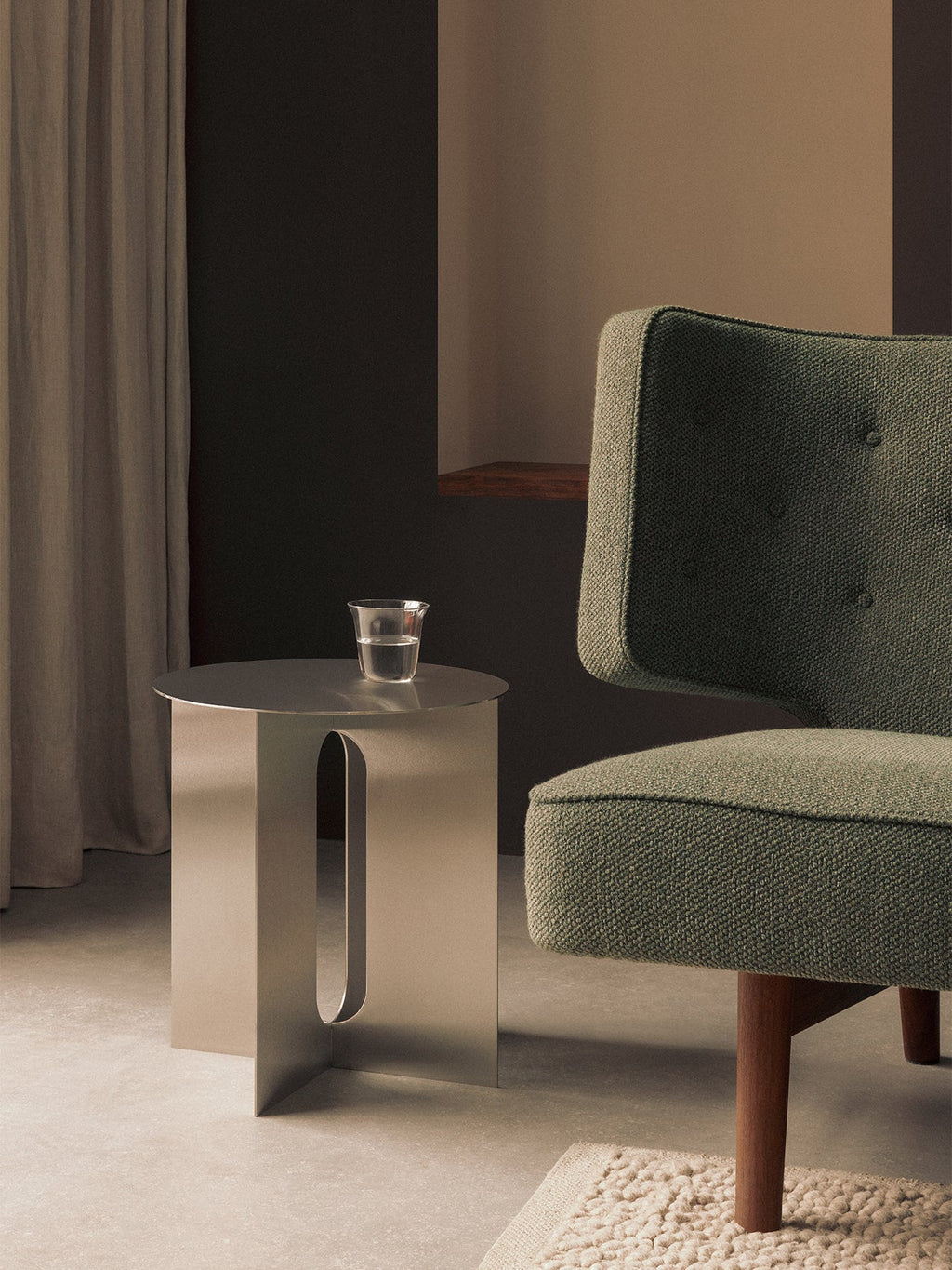 ANDROGYNE SIDE TABLE- BRUSHED STEEL